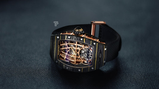 The RM 74-02 in Gold Carbon TPT and Red Gold, a striking luxury timepiece with an ultra-skeletonized tourbillon design.