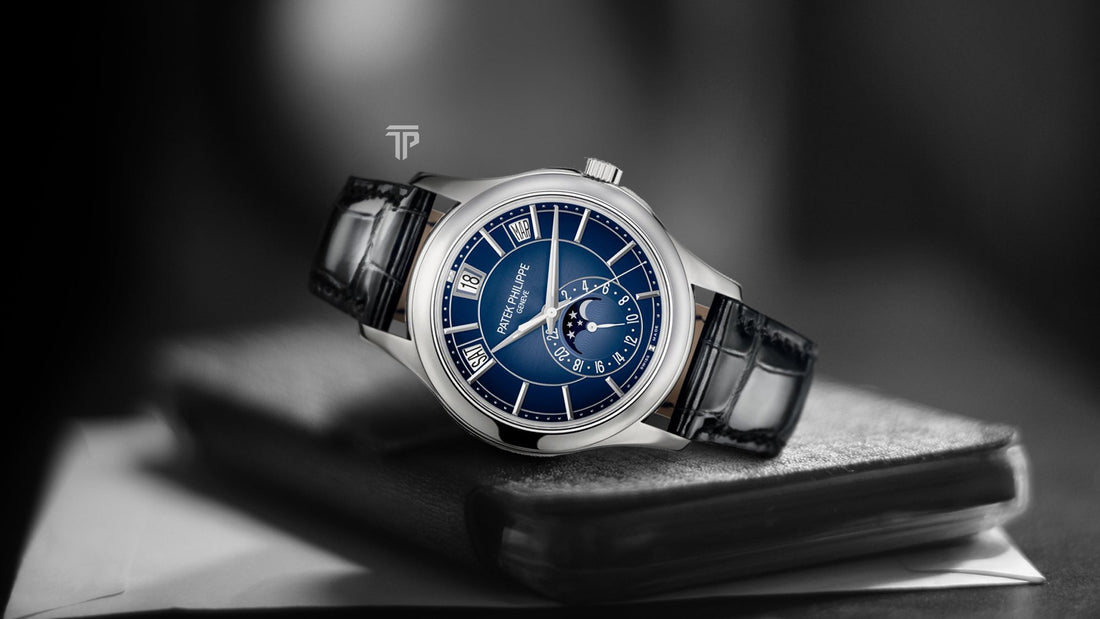  Patek Philippe 5205G 013 luxury watch featuring an annual calendar, moon phase display, and elegant white gold case.