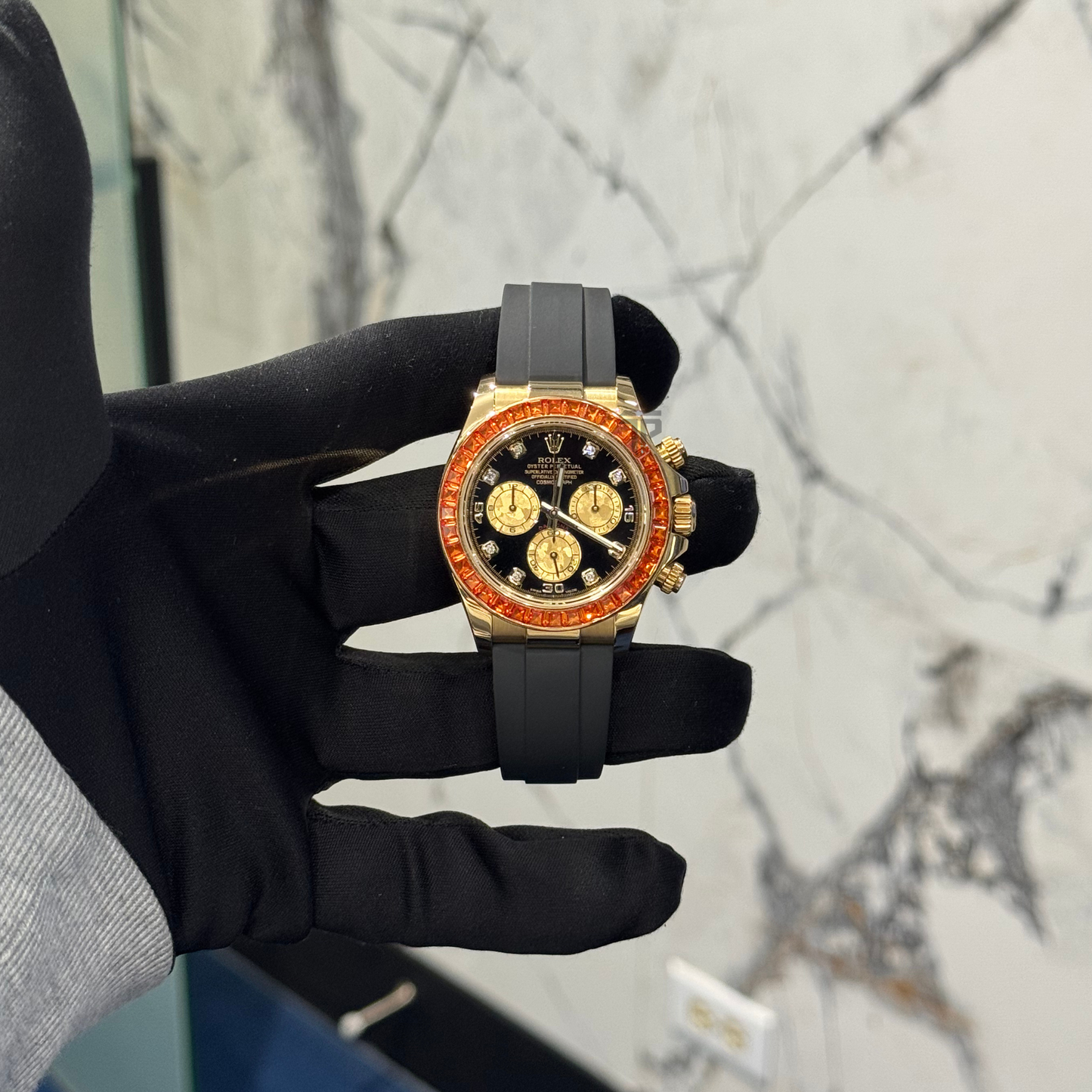 Rolex Daytona Ref. 116588SACO Yellow Gold Black Dial on Oysterflex with Orange Sapphire Bezel
