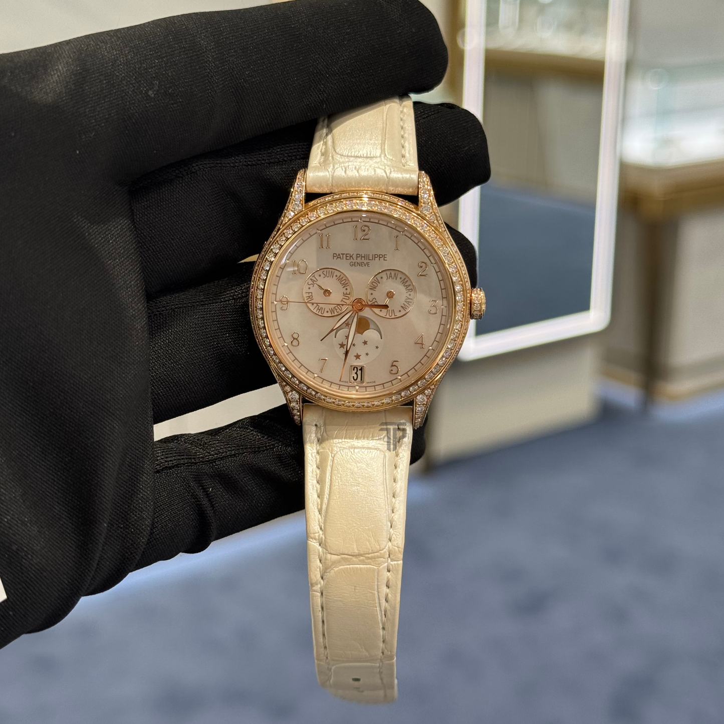 Patek Philippe Ref. 4948R-001 38MM Annual Calendar/Moonphase Rose Gold White Dial with Diamond Bezel
