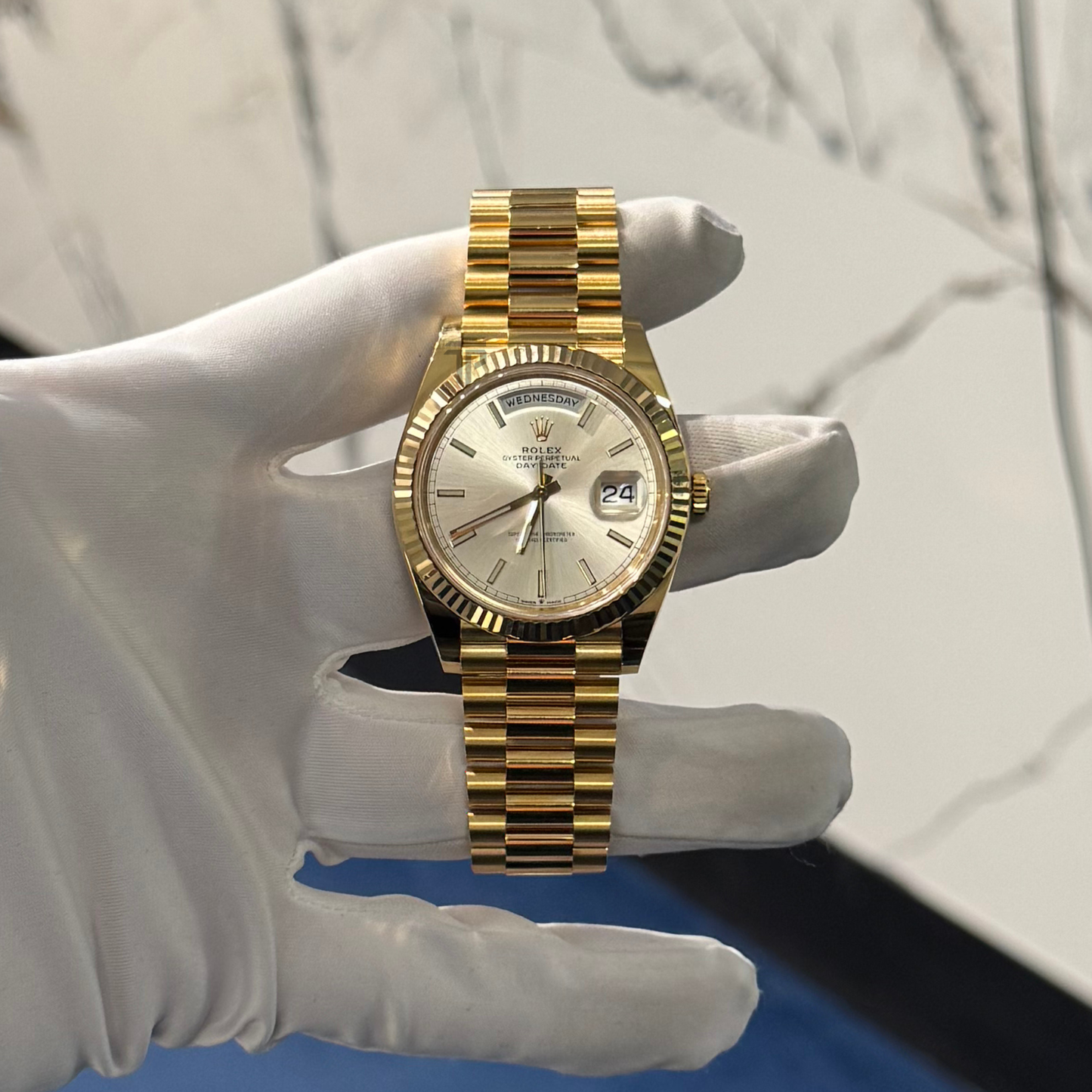 Rolex Day-Date Ref. 228238 40mm Yellow Gold with Silver Stick Dial Fluted Bezel