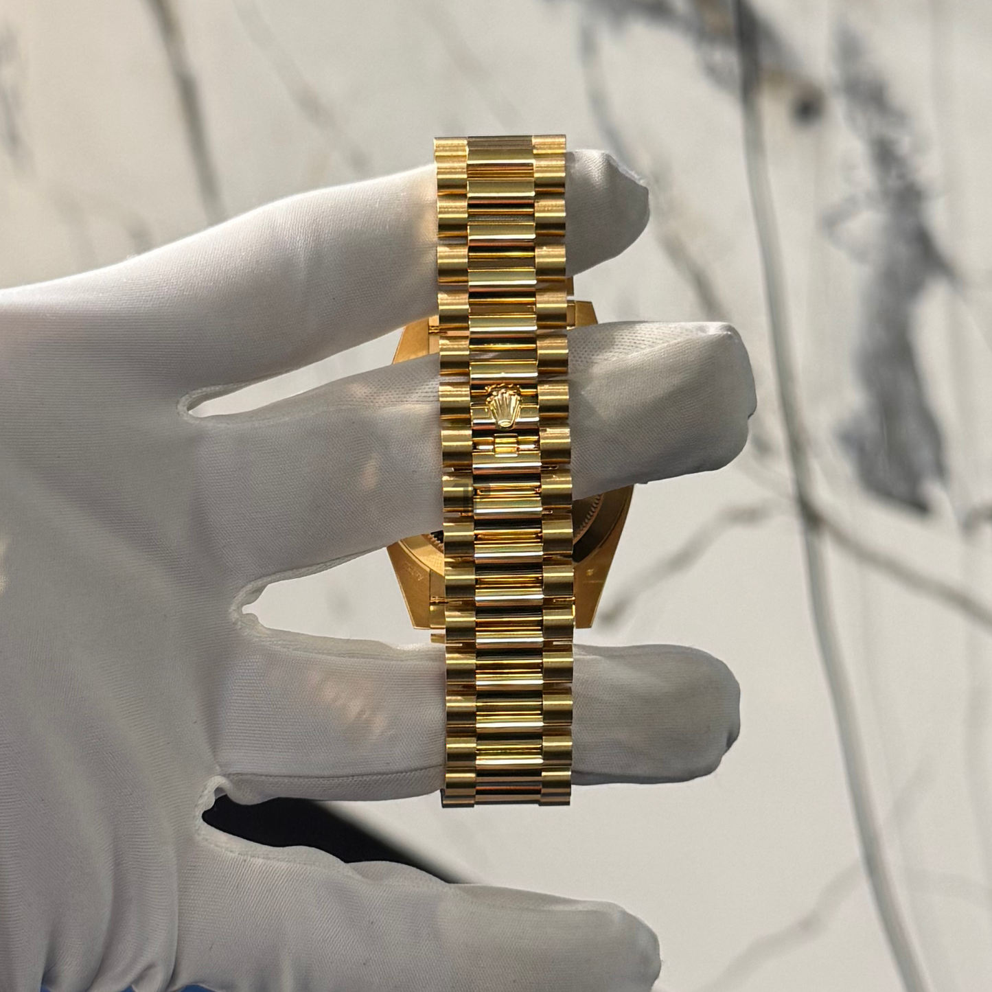 Rolex Day-Date Ref. 228238 40mm Yellow Gold with Silver Stick Dial Fluted Bezel