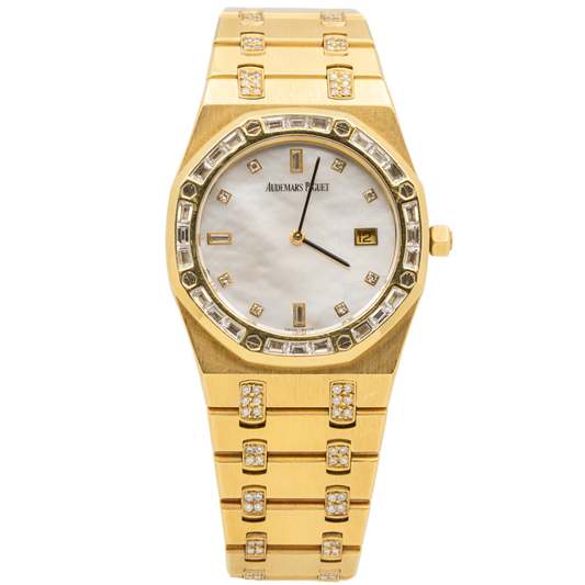 Audemars Piguet	Royal Oak Ref. 56602BA.ZZ.0789BA.04 33MM Yellow Gold Ladies  Factory Set Baguette Bezel and Bracelet with Mother of Pearl Dial